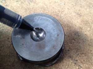 Laser Engraving of Number in Curved Area of a Mold Hairpiece